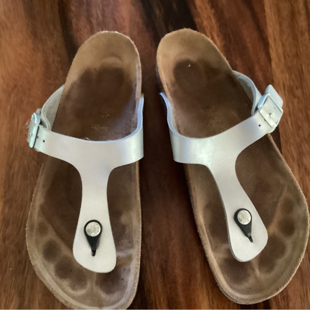 Silver colored Birkenstock size 43.